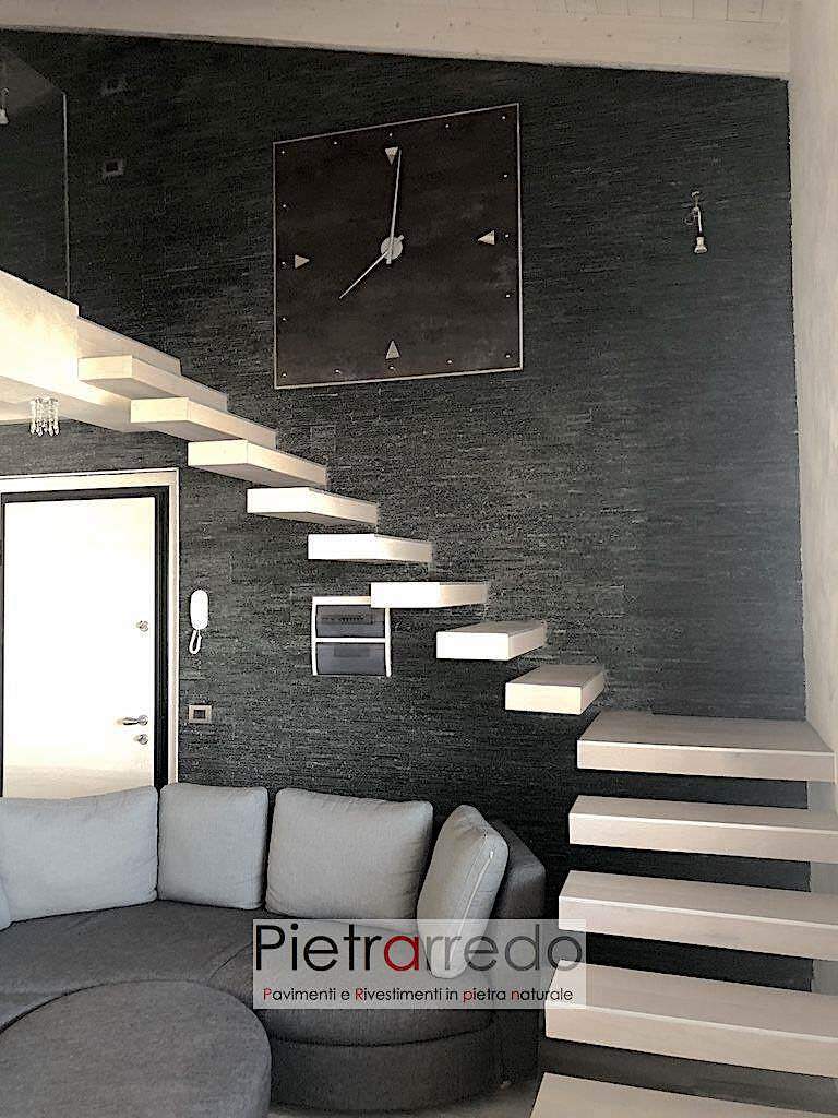 gradini a sbalzo scala e parete rivestita in sasso pietra nerp moderno pietrarredo quarzite nera slim prezzo stone wall black