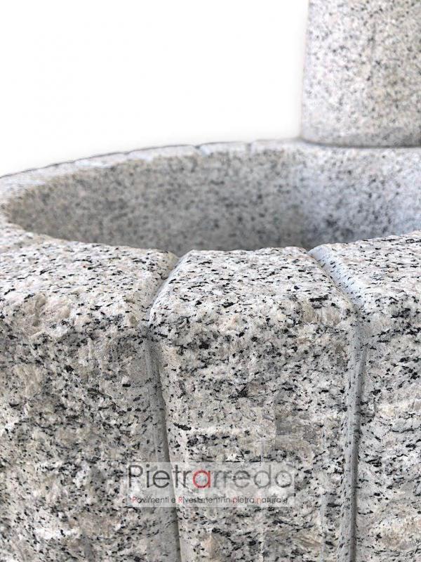 fontana con rubinetto da terra in mezzo al prato granito prezzo erica sasso