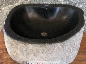 lavandino in sasso pietra roccia scavata con attaccco rubinetto pietrarredo milano prezzo sink stone