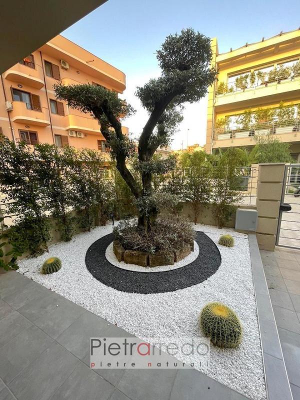 aiuola elegante arredo giardino stone ghiaietto neo bianco sotto ulivo pietrarredo milano