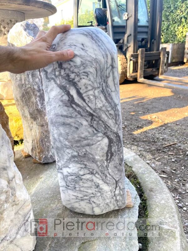 monolith work of art in polished Carrara type stone tips for garden furniture pietrarredo cost